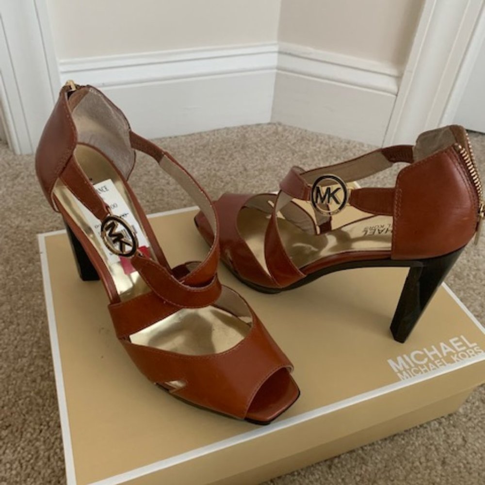 Ladies Dresses, Shoes (MK, C Santana, Kenneth Cole Reaction and Purses (D&B)